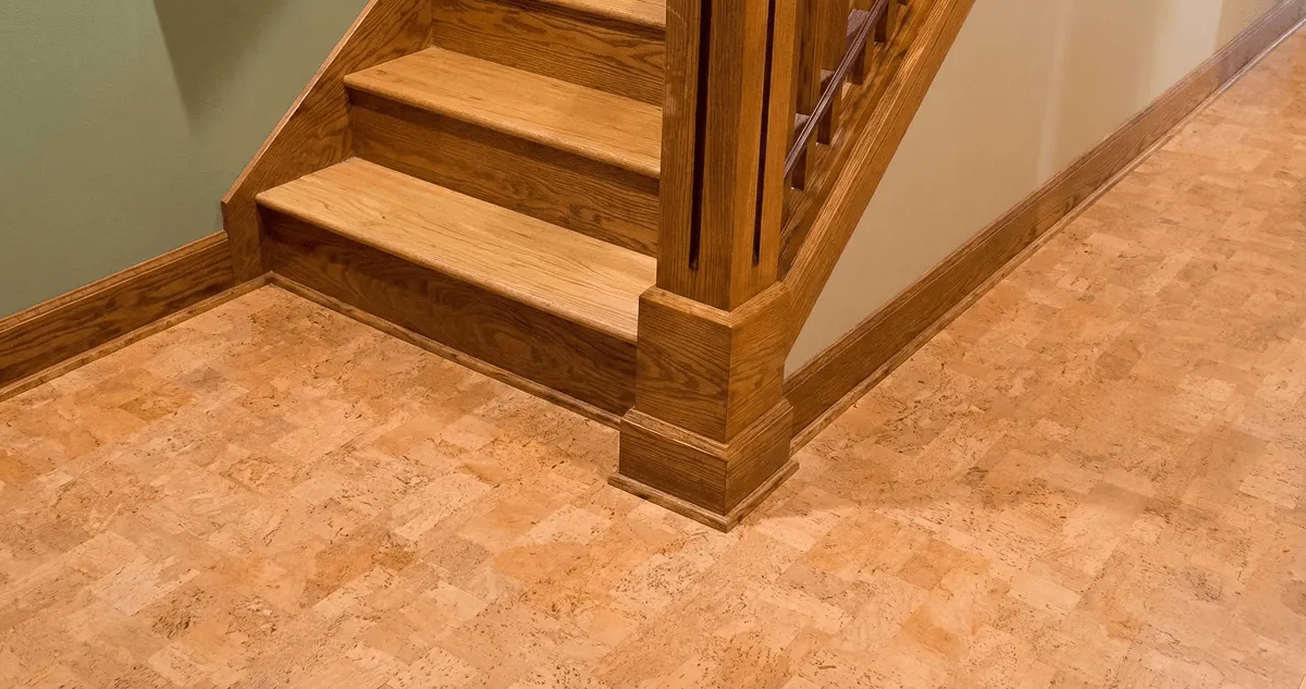End of a staircase with cork flooring in Peoria, IL