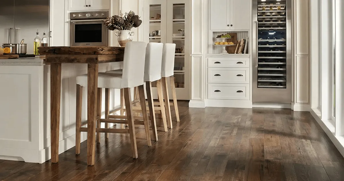 Professionally installed and refinished hardwood flooring in a residential home, showcasing smooth finish and natural wood tones in Peoria, IL