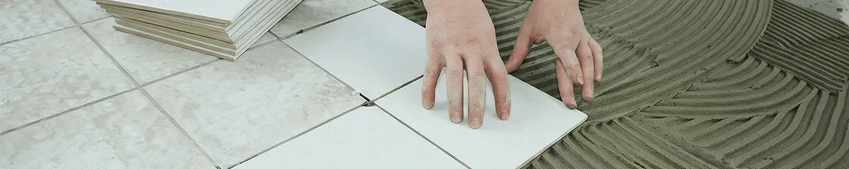 Professional installing white tile floors in Peoria, IL